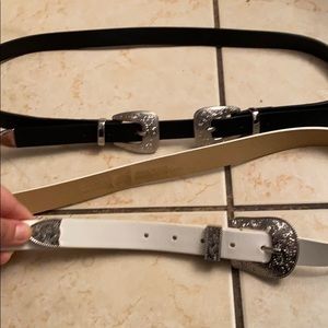 A double buckle belt and a single buckle belt